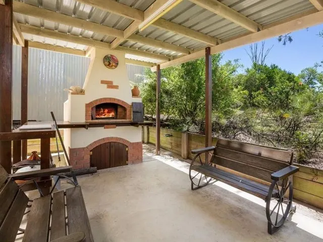 The wood-fired pizza oven and seating