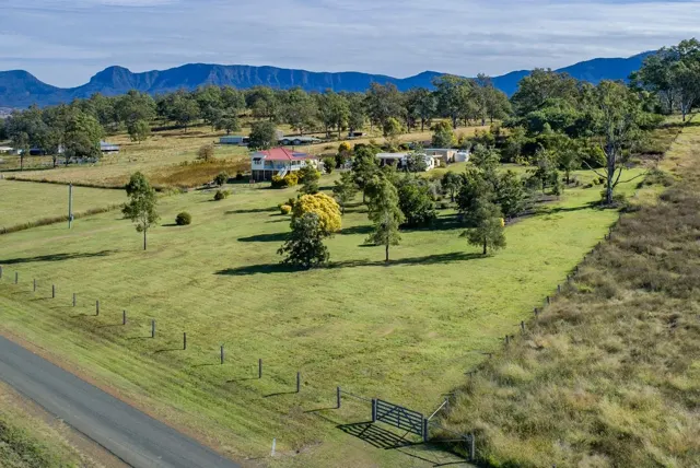 The property and surrounding farmland from above