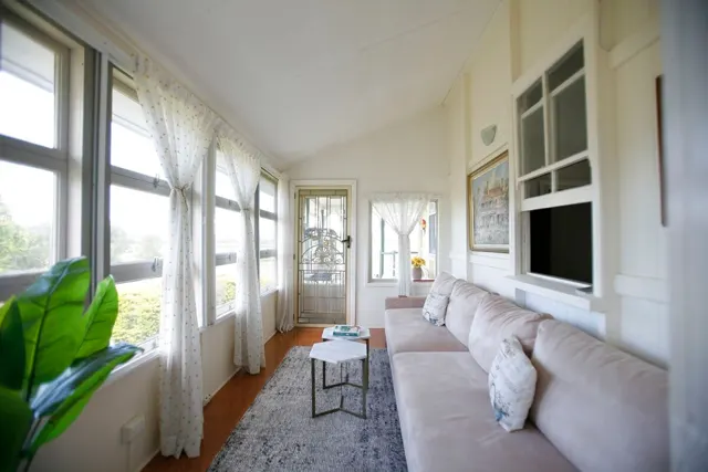The light-filled sunroom